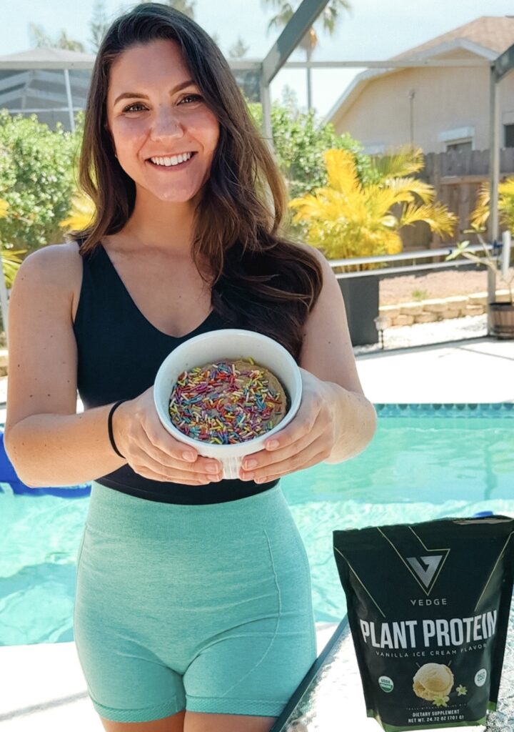 me holding a vegan protein mug cake